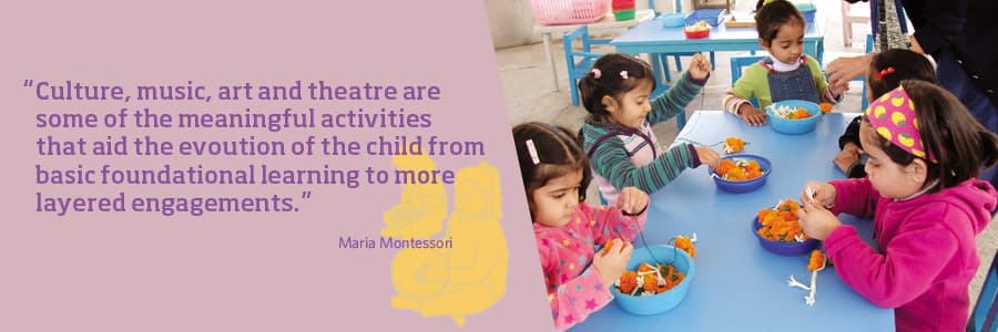 Children exploring culture and music materials at the magic years